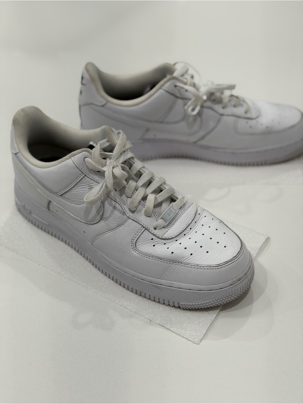 Nike White Low-Top Leather Sneakers with Perforated Toe